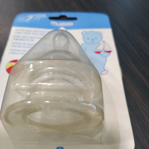 Mustela baby microwave sterilizer new with 4 biberon and nipples