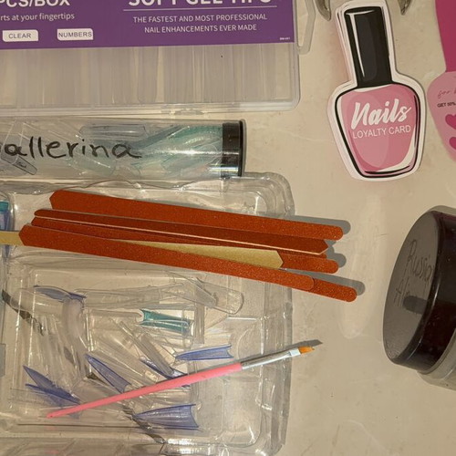 Nail products set like new with dual forms, tips, and accessories