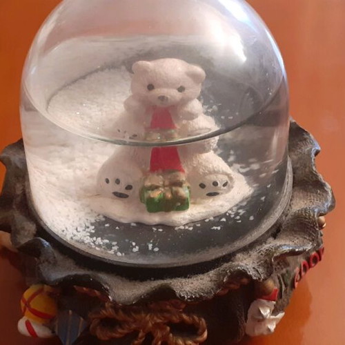 Glass globe with teddy bear like new