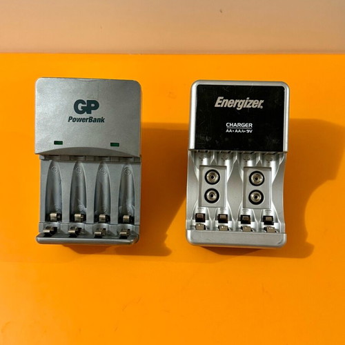Set of 2 used battery chargers for AA, AAA and 9V