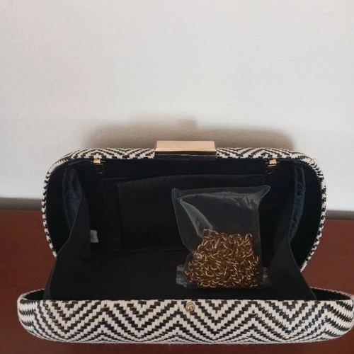 Clutch bag with hard frame, new, black and gold chevron pattern