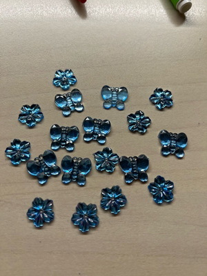 Charms in flower and butterfly shapes new