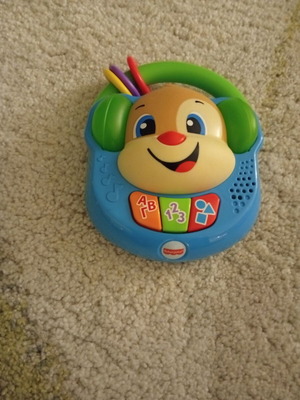 Fisher Price dog toy used with songs and lights