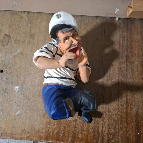 Porcelain figure new, man sitting on barrel