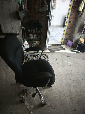 Office chair slightly used with minor fabric wear, swivel