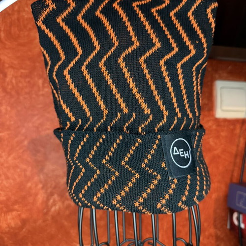 Akyla "Ferto" Eurovision Beanie like new, black and orange knit