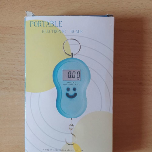 Mini scale with batteries in excellent unused condition