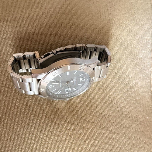 Tommy Hilfiger wristwatch with grey and silver case and bracelet