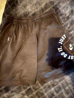 Nike Just Do It shorts size medium like new, black and orange