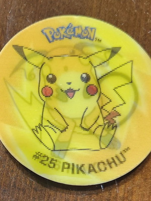 Collectible Pokémon Flippo 2001 used with Gastly marble and Gryffindor crest