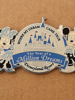 Disney pin like new, The Year of a Million Dreams with Mickey and Minnie Mouse
