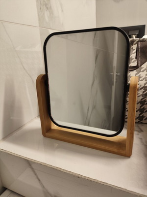 Two-dimensional tabletop mirror like new, rotating