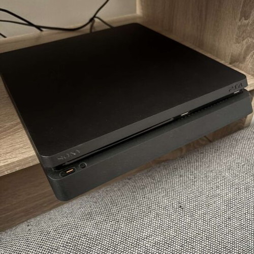 PlayStation 4 (PS4) like new with 14 games
