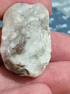 Natural raw stone with white crystallized texture, like new