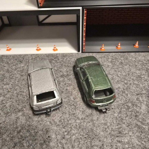 Golf 1/56 and Golf IV GTI 1/57 used, set of 2 toy cars