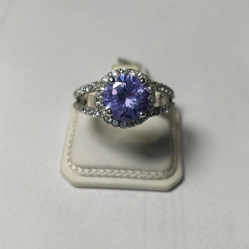 Silver (925) ring new with purple stone and smaller stones