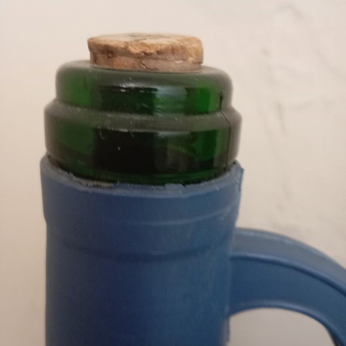 Glass bottles set of 2 used, one with moisture marks