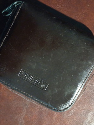 Leather wallet used brown with three compartments and zipper