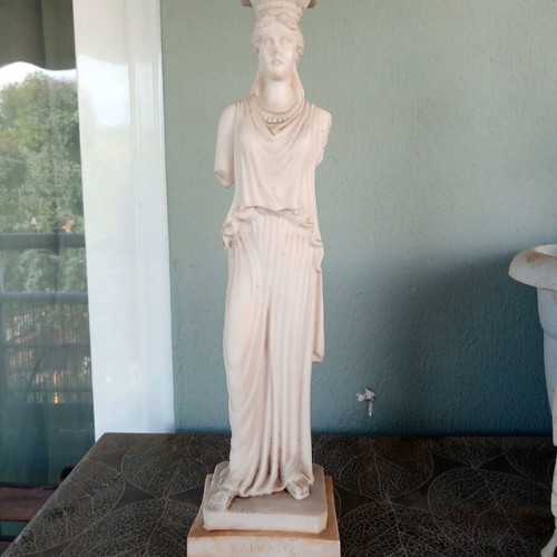 Large Caryatid statue used, made of alabaster