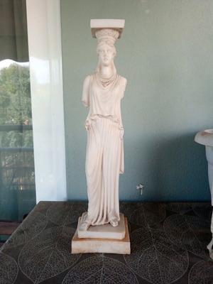 Large Caryatid statue used, made of alabaster