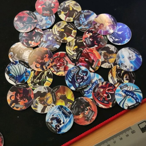 Monsuno Cheetos 2013 caps used, set of 30 pieces