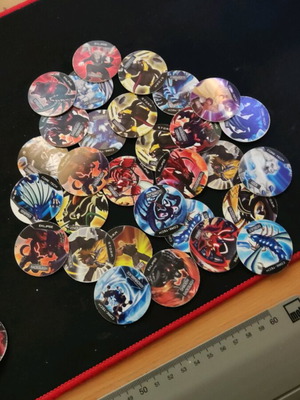 Monsuno Cheetos 2013 caps used, set of 30 pieces