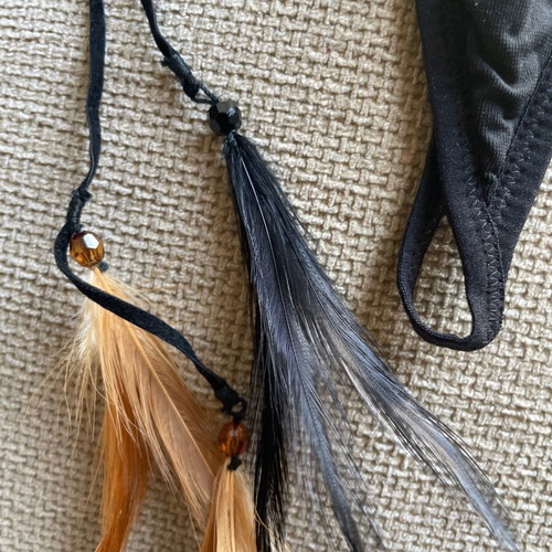 Wonderbra thong black like new with feather details