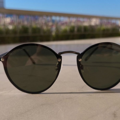Sunglasses with round lenses like new, black and gray