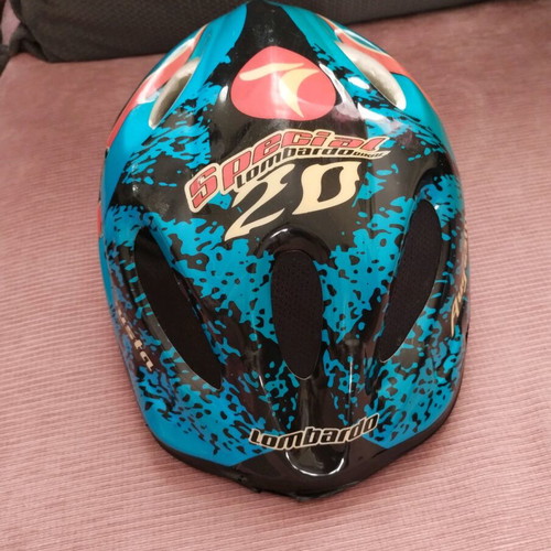 Children's safety helmet like new with colorful designs size 52-56