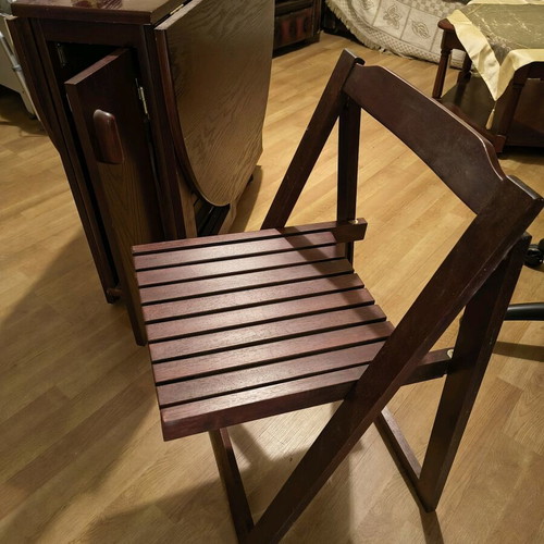 Solid wood folding table with 4 folding chairs used