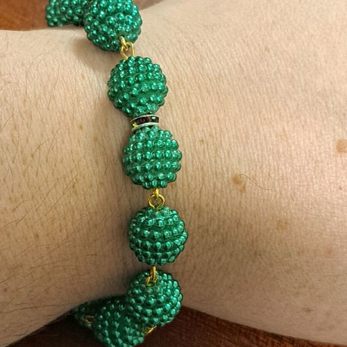 Earring and bracelet set like new, gold color with green bead