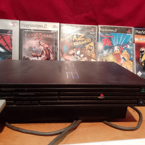 PlayStation 2 (PS2) used with 5 games pack and controller