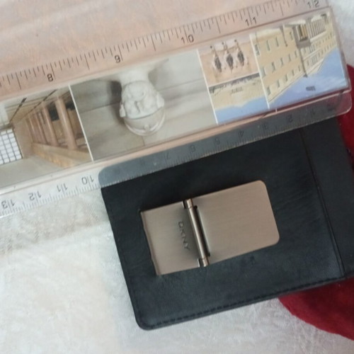DKNY pin with metal clip like new
