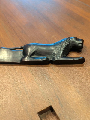 Wooden paper cutter used with handmade African art carving
