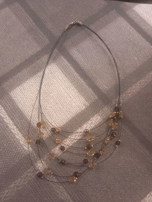Short necklace with beads used, multi-strand in brown shades