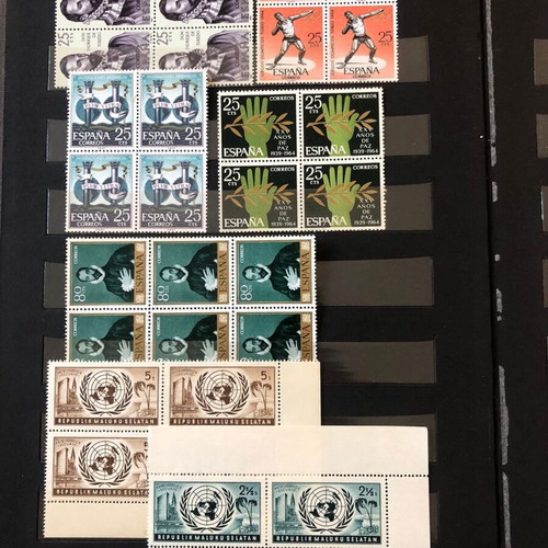 Stamp album with large collection of mint and used blocks worldwide
