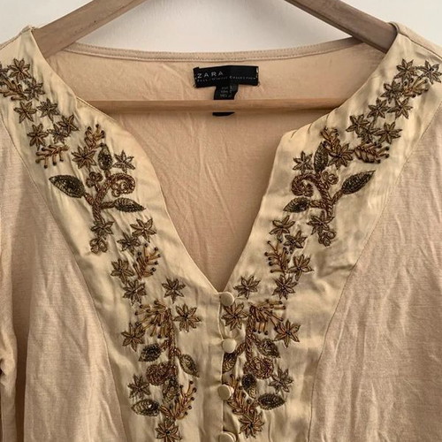 Zara blouse beige size L used with small hole and wear