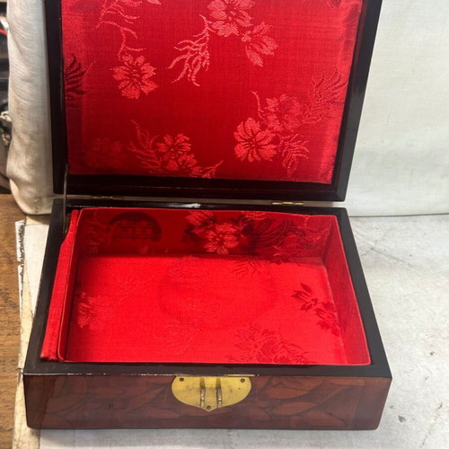 Vintage wooden jewelry box used with red satin lining