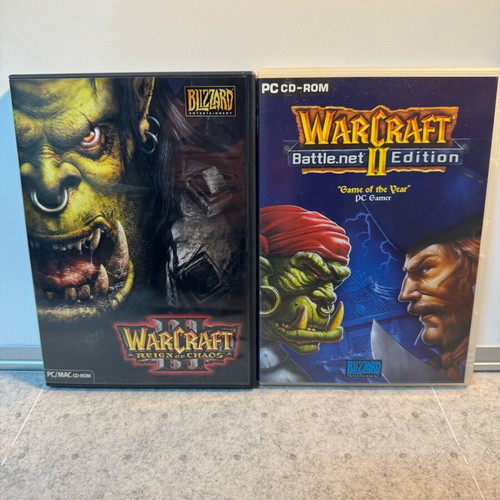 Warcraft PC games set used, Warcraft 2 Battle.net Edition no manual, Warcraft 3 with manual