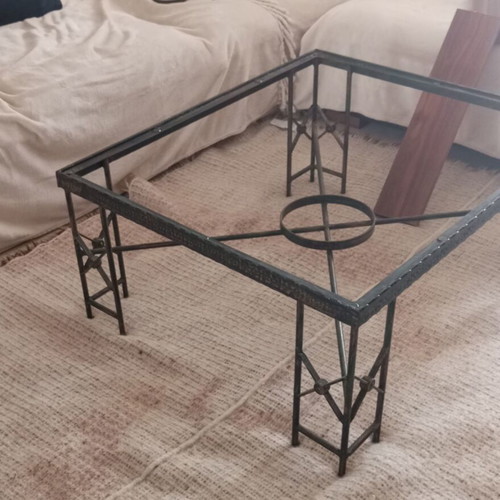 Metal table used with ceramic decoration and antique finish