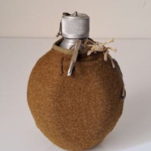 B-N aluminum canteen with khaki wool cover, collectible