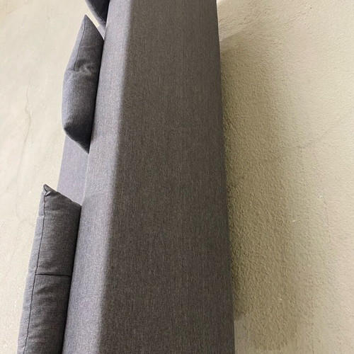 Three-seater sofa bed like new with storage space and 3 cushions