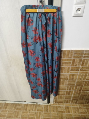 Women's blue palazzo pants with red flowers, size Large