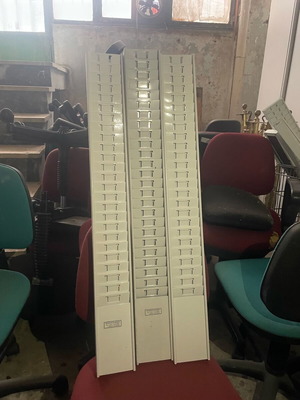 Metal wall card holders used, 25 slots, white