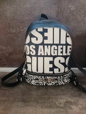 Guess backpack used with leather cracks