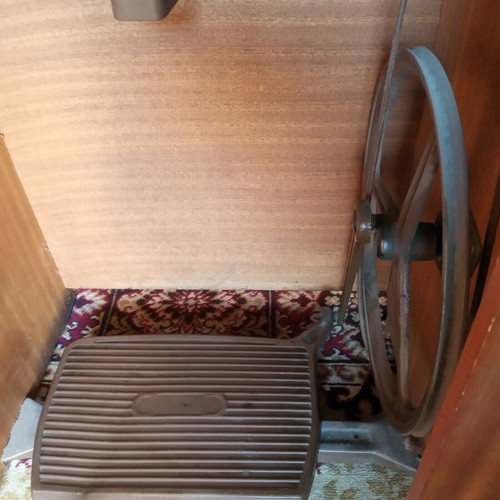Mrsedes sewing machine used with antique furniture