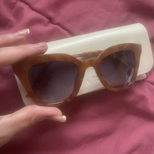 Sunglasses new with case, beige