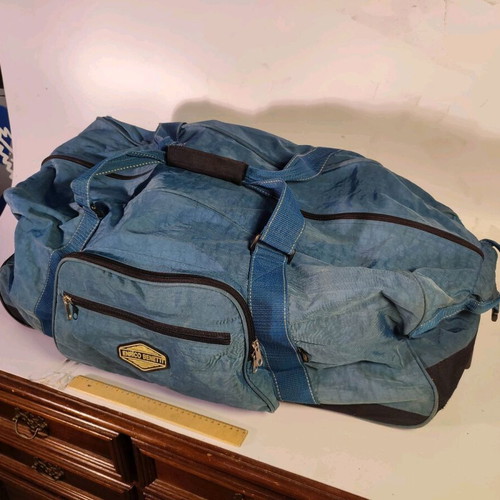 Large Enrico Benetti suitcase used with wheels and hard base blue