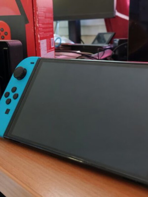 Nintendo Switch OLED console blue and red