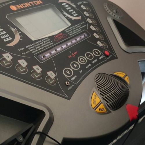 NORTON treadmill like new with programs and fan